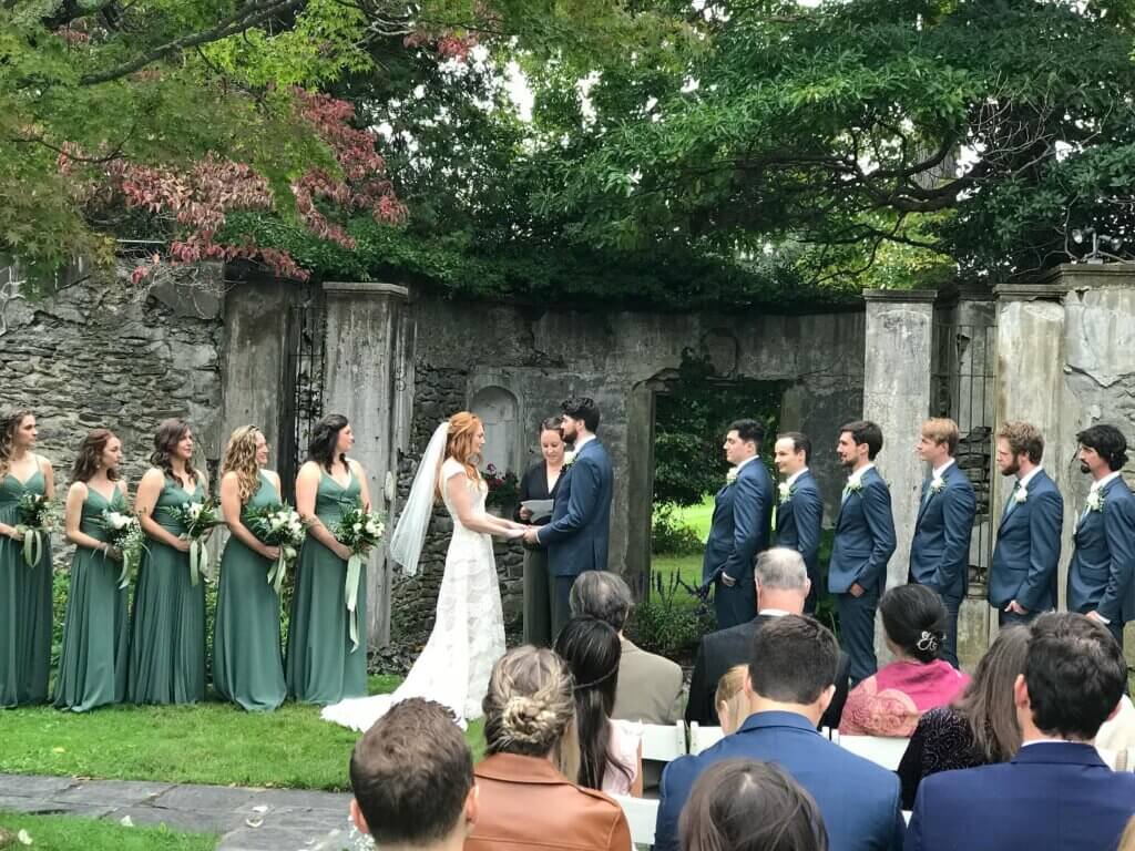 An outdoor wedding ceremony at historic Gwyn Careg located in CT.